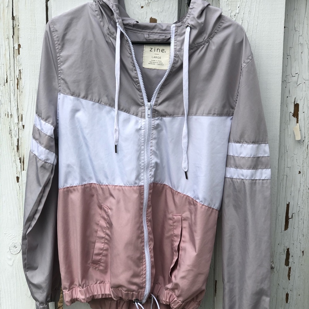 Grey white and pink(?) windbreaker